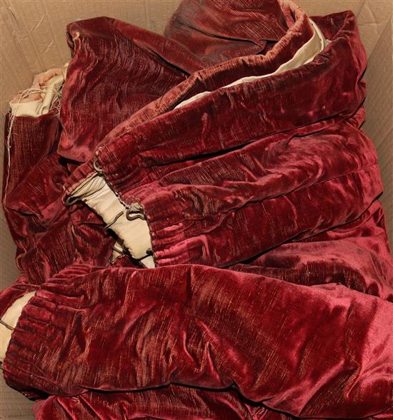 A pair of red velvet curtains